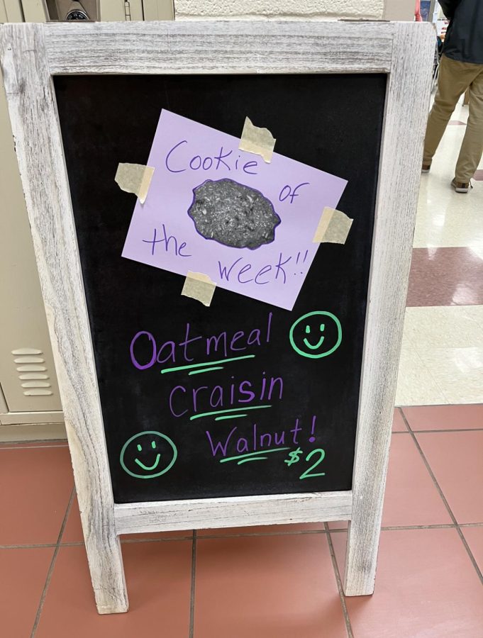 Sign outside of the Cozy Cafe selling cookies