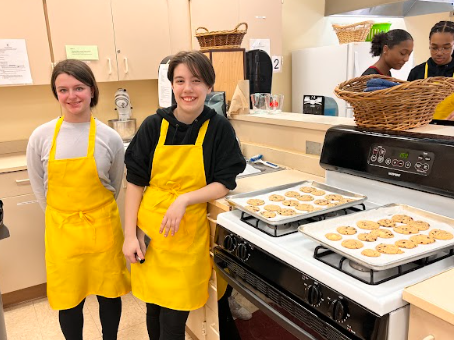Baking Club members Maryella Kearney  and Merrick Gilroy next to their chocolate cookies that are fresh out of the oven.