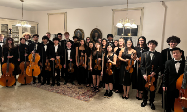 Monroe-Woodbury High Schools Chamber Orchestra posing before their performance.