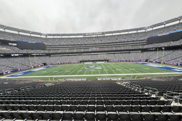 Students looked out from the press box, which allows sports journalists to record the game in real-time.