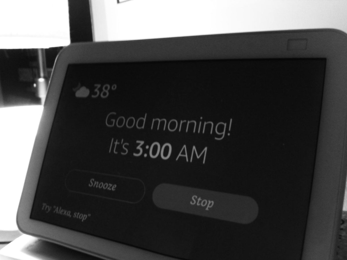 A digital alarm clock displaying the time as 3:00 a.m. Photographer: Benicio Garcia.