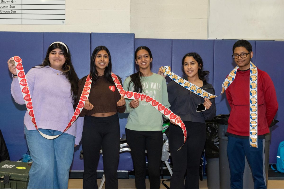 Volunteers from FBLA prepare to help donors after their blood is drawn.