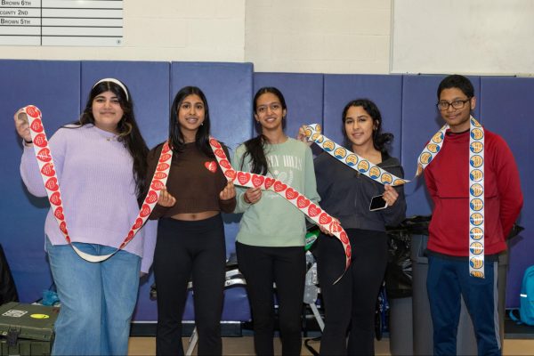 Volunteers from FBLA prepare to help donors after their blood is drawn.