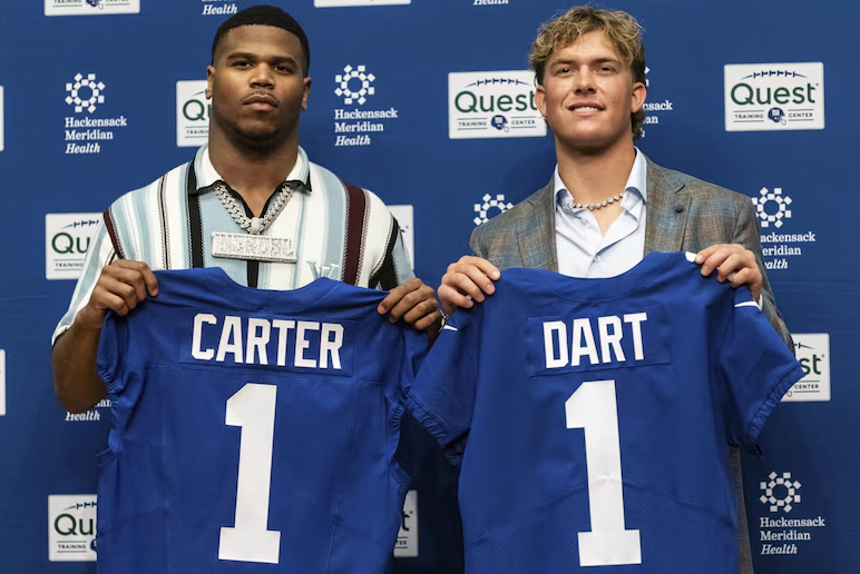 (Photo Credit: AP Photo/Stefan Jeremiah) Abdul Carter and Jaxson Dart introduced at their inaugural press conference.